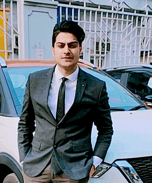 Professional man in suit standing outdoors near car, representing reliable cleaning services.