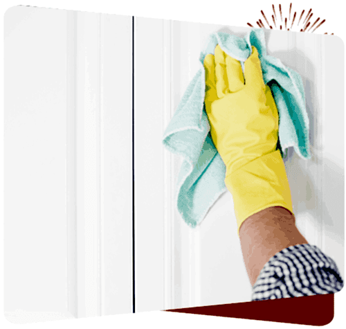 Microfiber cleaning cloth being used on a white cabinet for spotless cleaning.